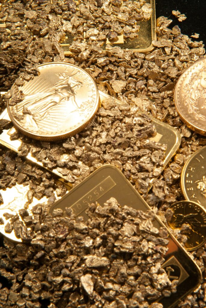 gold in coins, nuggets and ingots