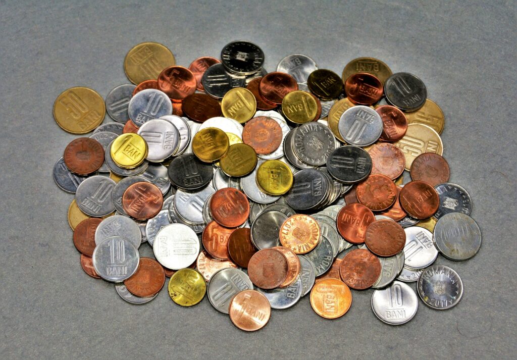 Top-view of a pile of silver and gold Romanian coins